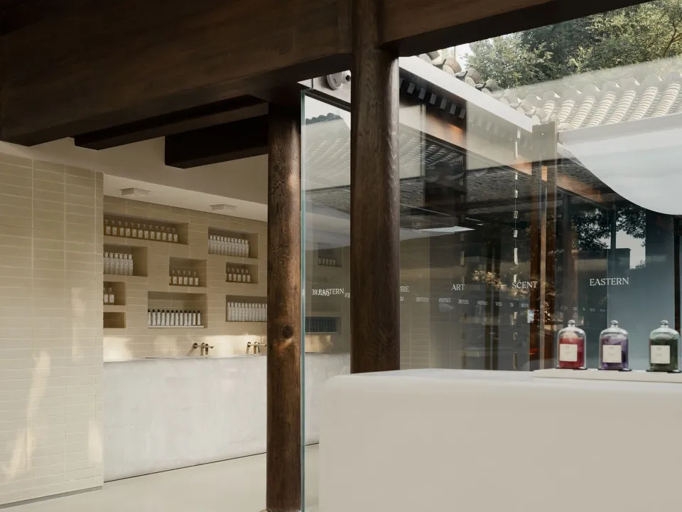 Modern retail storefront featuring polished wood and glass elements.