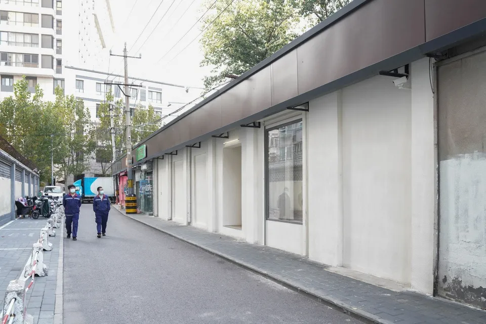 Concrete storefronts along an urban street