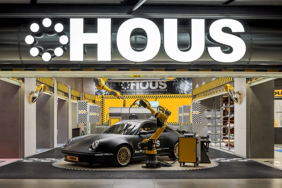 Automotive-themed retail exhibition with metallic black design elements