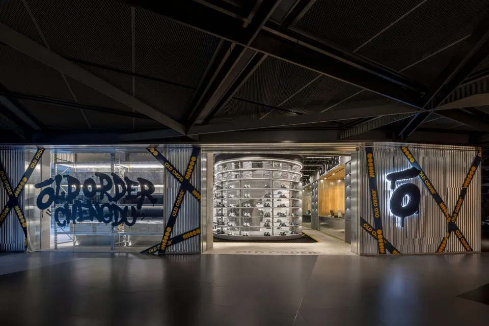 A modern retail shoe store featuring metal and glass elements.