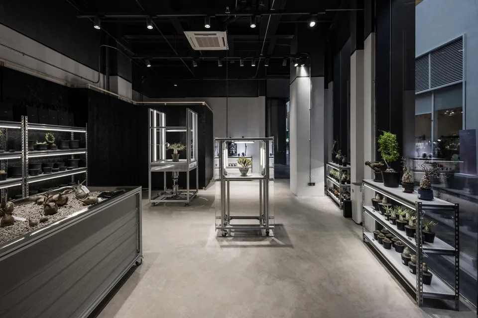 Industrial-themed retail store with metal shelving and display cases
