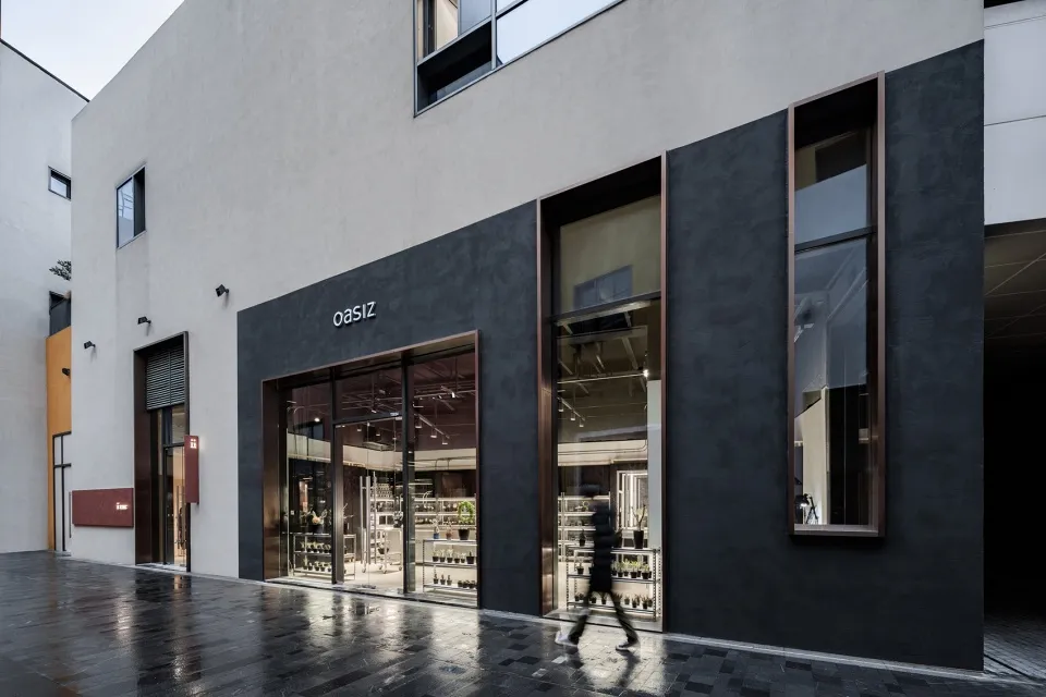 A modern storefront featuring a concrete exterior.