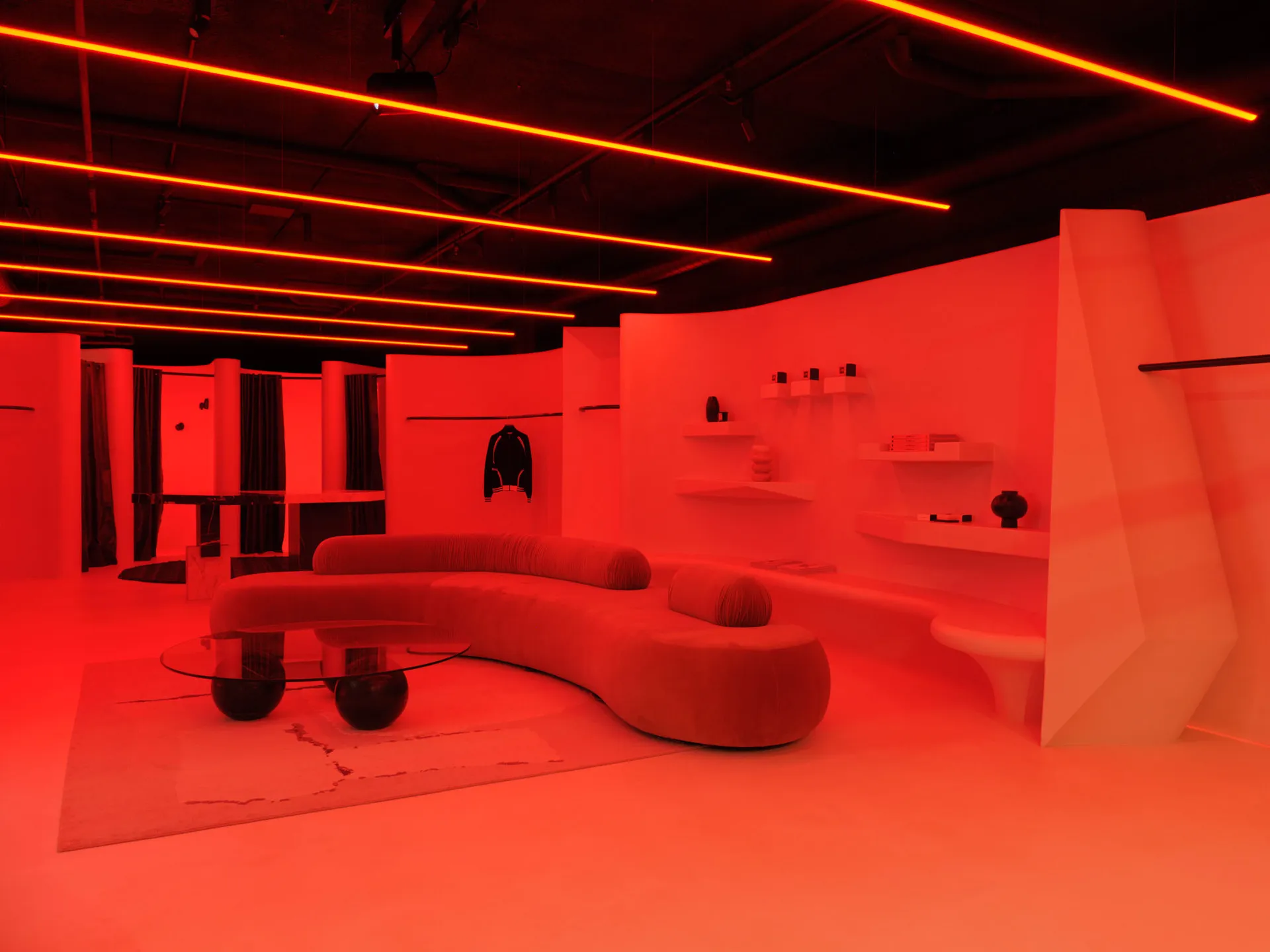 A modern retail space featuring geometric shapes and bright lighting.