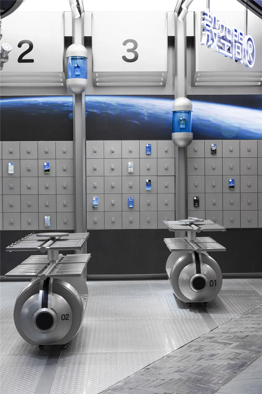 A futuristic space laboratory with metallic carts and glass structures, featuring a planet view backdrop and numbered lockers