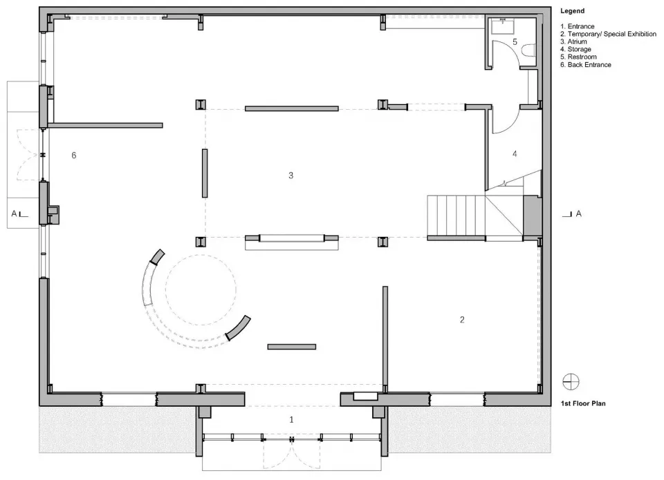 A 2D architectural drawing depicting a top-level floor plan of a modern industrial building with a central atrium, storage ar
