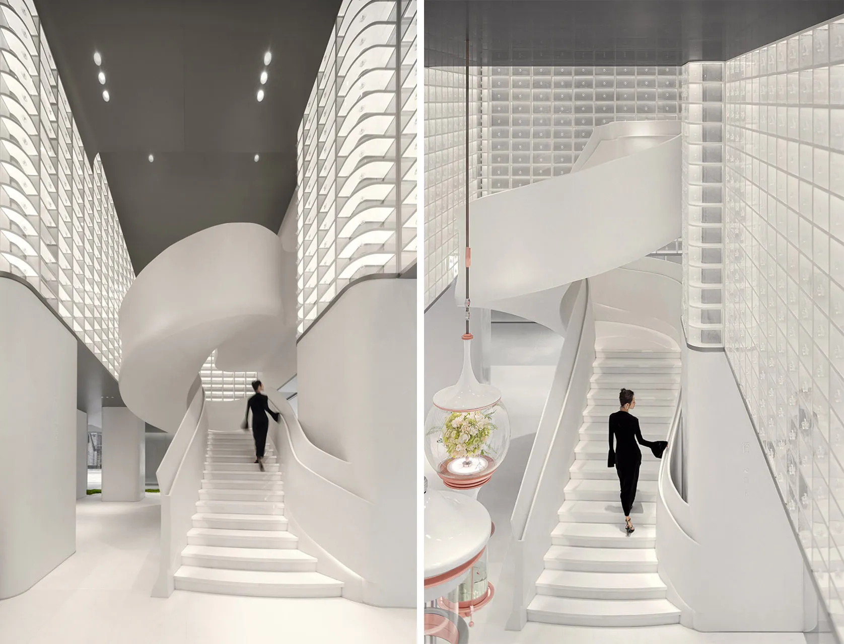 A sleek, modern staircase with white marble steps and walls, featuring a contemporary design.