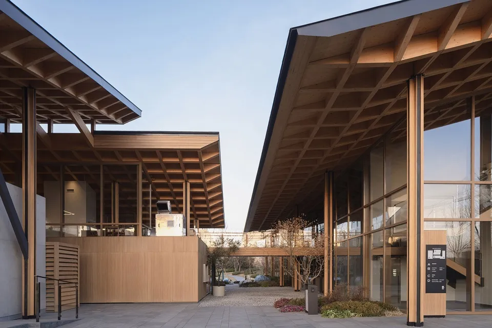 Modern commercial office space featuring wood and glass materials.