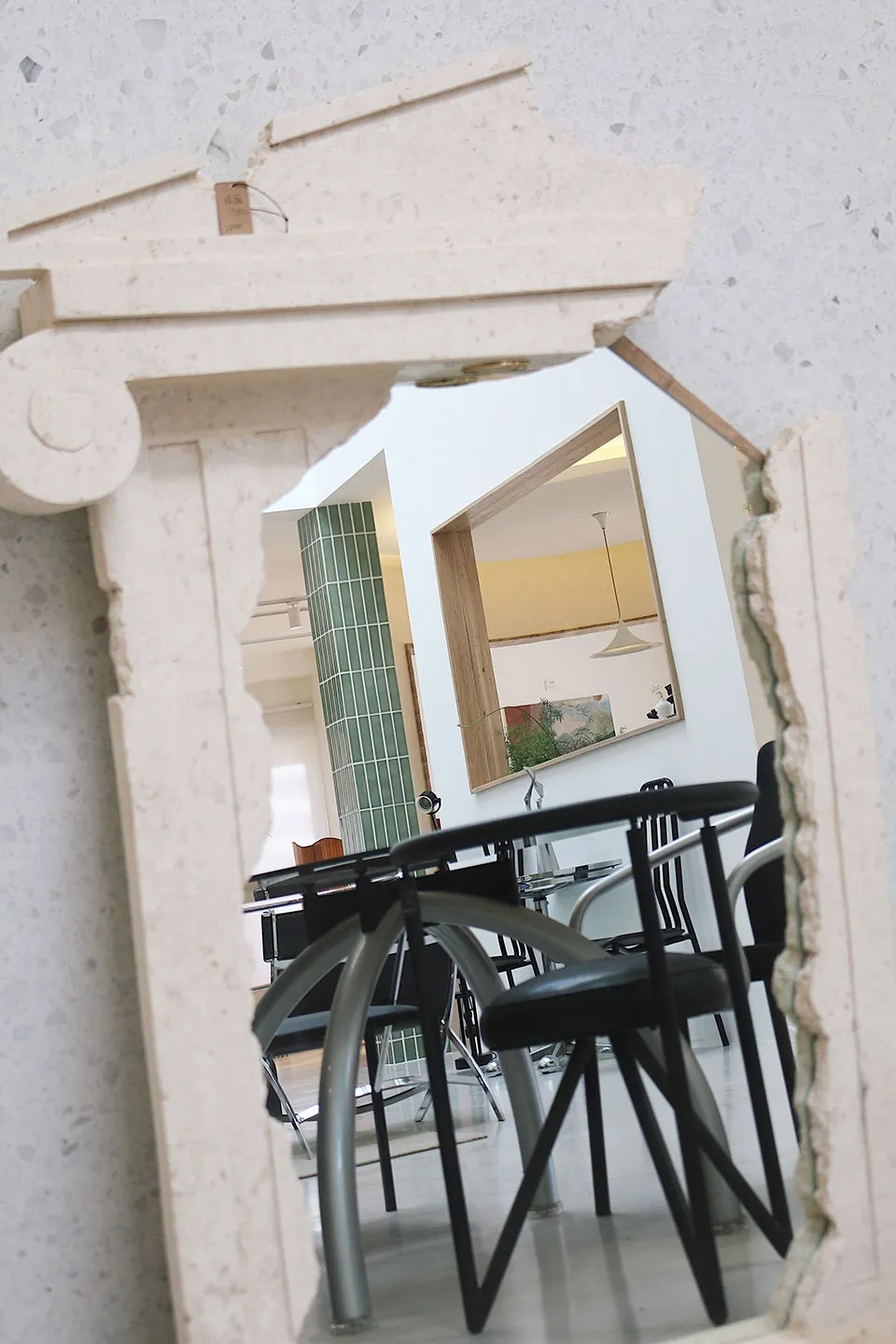 A modern interior design showcasing a metallic frame structure.