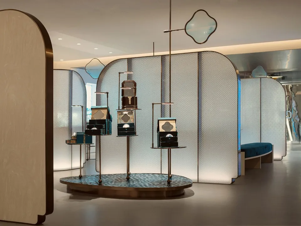 Modern retail storefront displaying metal and glass elements.