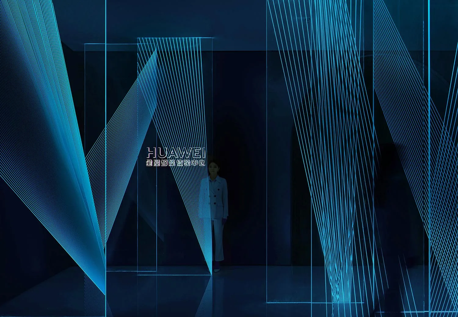 A minimalistic design featuring neon lighting in an experiential center for Huawei products.