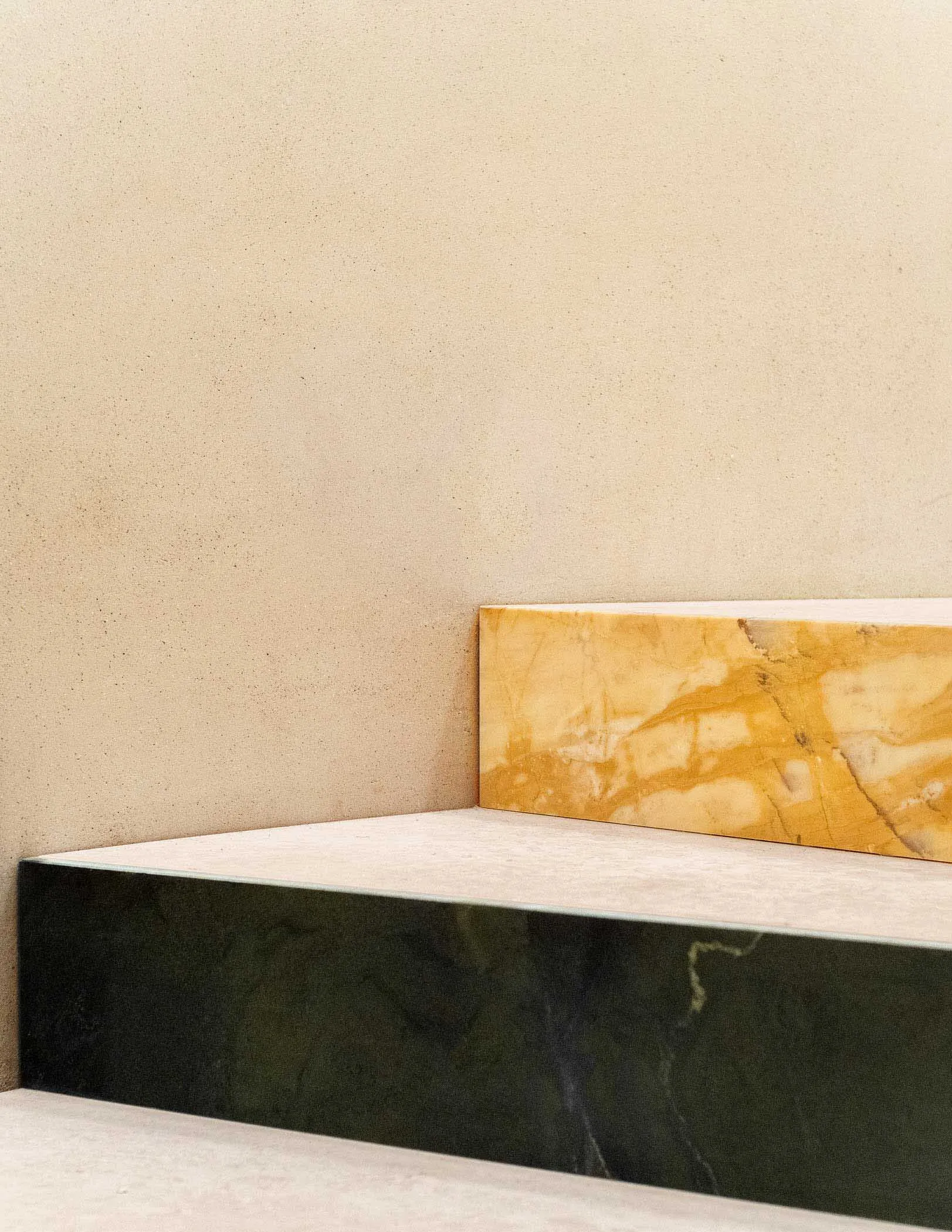 Clean, minimalist interior featuring natural marble elements.