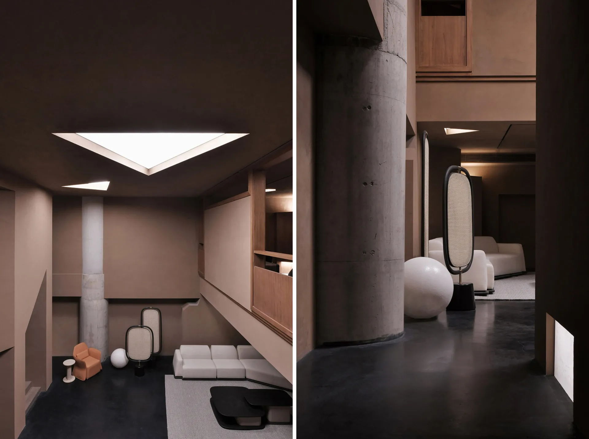 A modern interior living room with exposed concrete and wooden elements, featuring a unique lighting fixture and contemporary