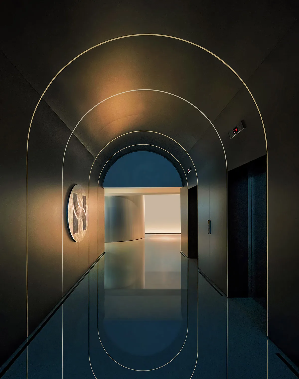 Modern architectural corridor with metallic design and minimalist style.