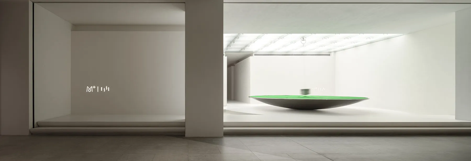 Minimalist installation featuring an aluminum aircraft