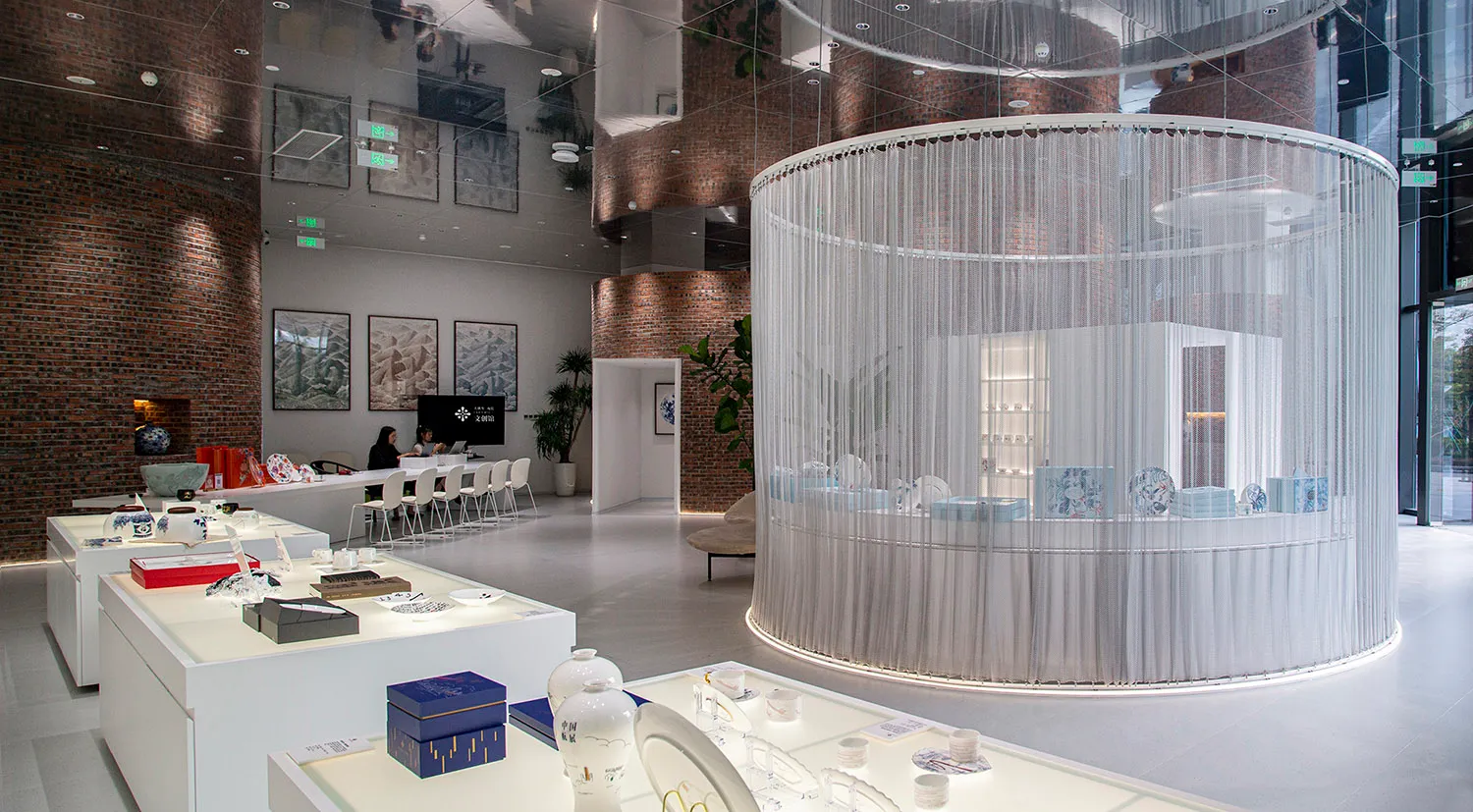 A modern ceramic shop featuring glass and ceramic displays.