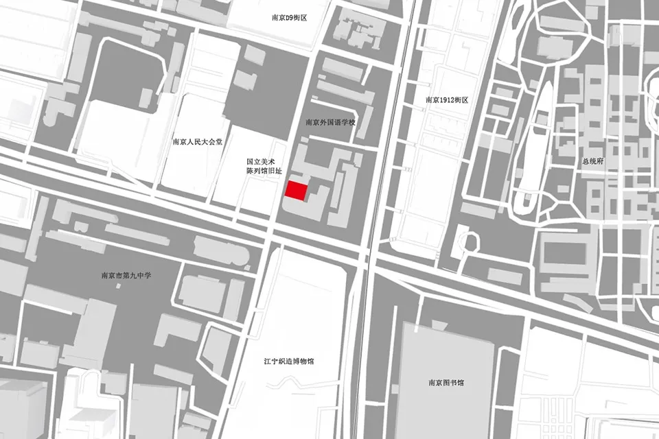 Urban city center layout with a marked red area and labeled nearby landmarks.