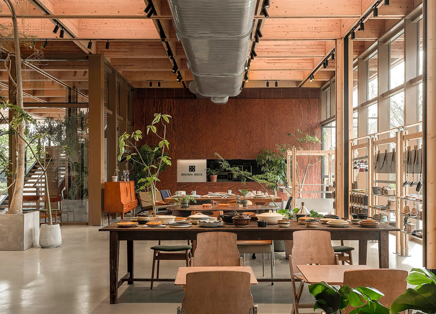 An industrial-style retail storefront featuring wooden materials and a spacious, open layout.