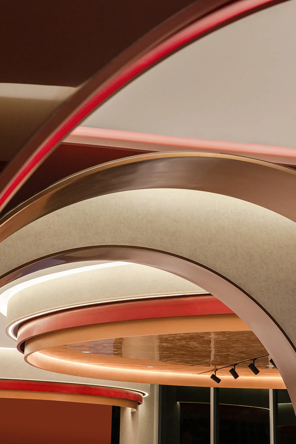 Modern interior ceiling featuring metallic and glass elements
