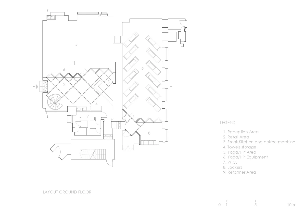 An overhead view of a gym facility's layout with various designated areas such as reception, retail, yoga, lockers, and equip