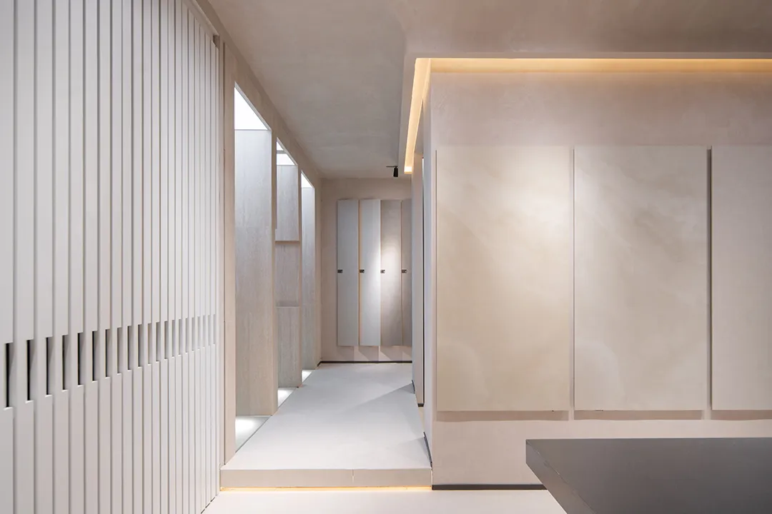 Minimalist interior space featuring concrete materials and industrial design elements