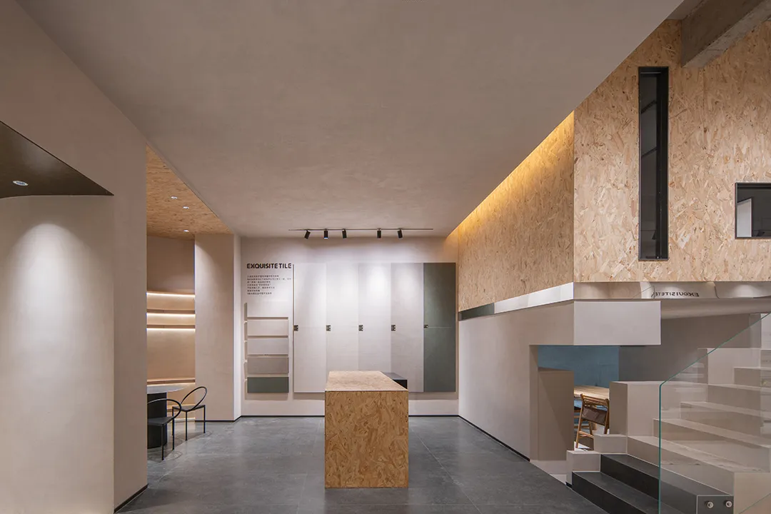 Modern retail shop featuring a concrete floor and walls adorned with wooden elements and illuminated by LED lighting.