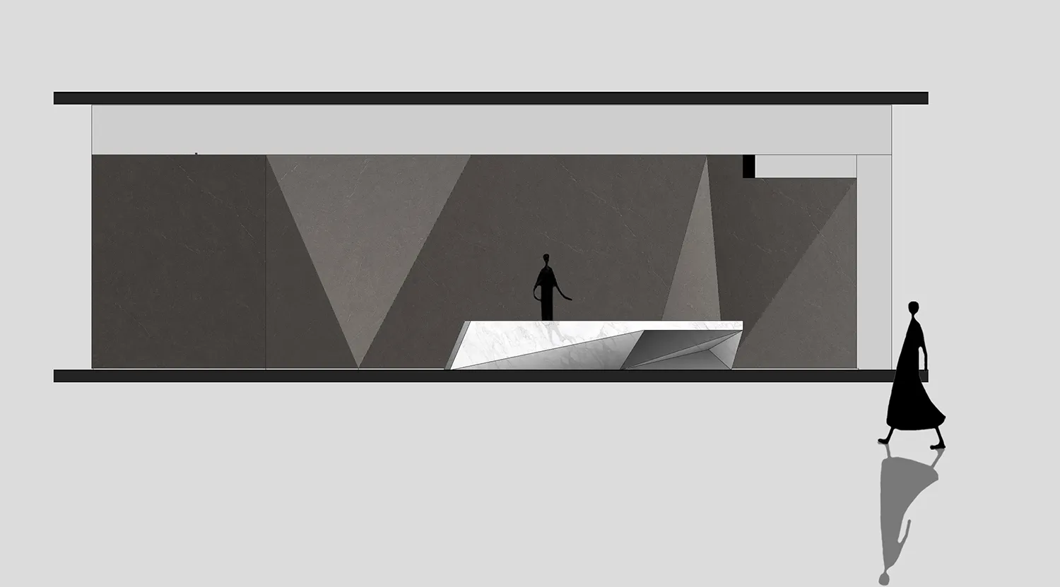 Modern office space with a reception desk, grey walls, and a woman walking by.