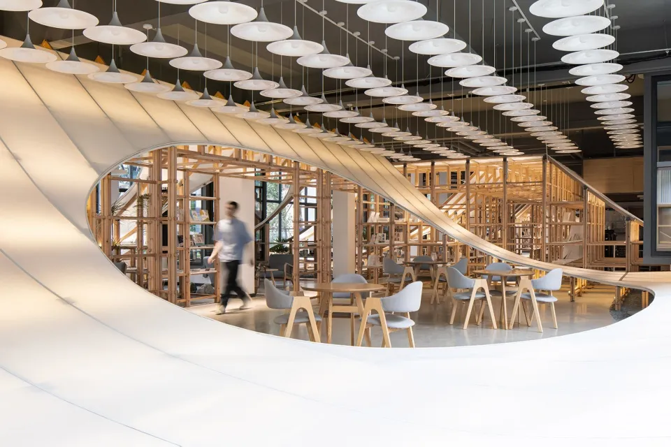 A modern cafe interior featuring wood materials.