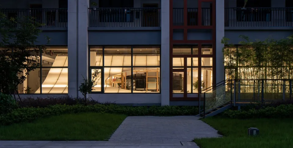 A modern office space featuring glass and metal materials.