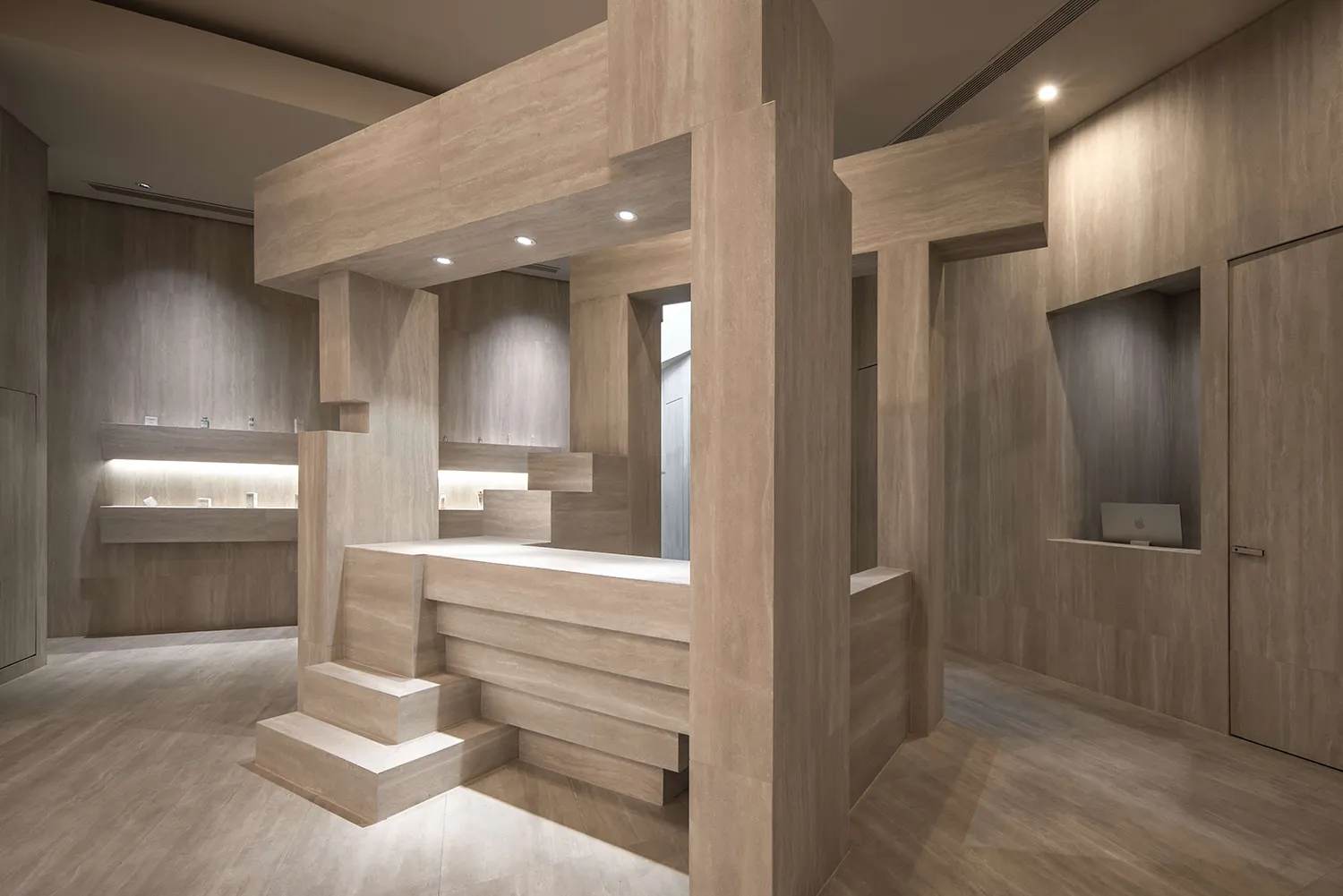 Modern interior commercial space with travertine materials