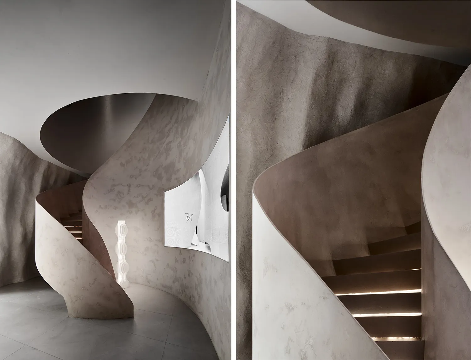 An image of a modern, spiral staircase made of concrete.