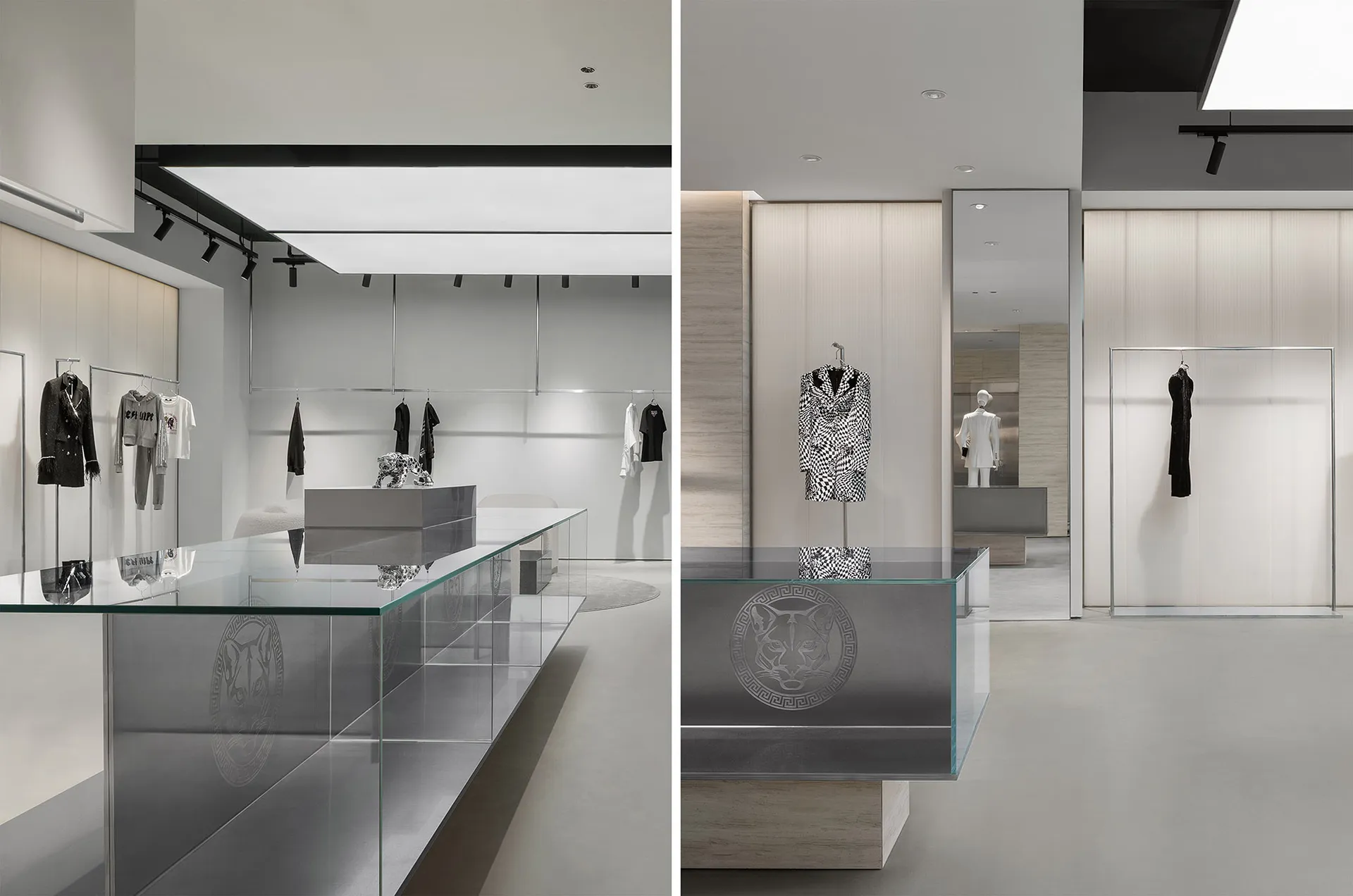 A modern retail interior with glass displays, concrete surfaces, and metal accents.