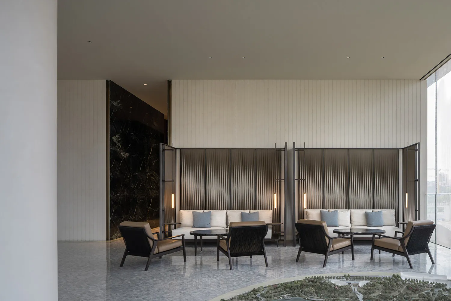A modern interior design space featuring textured wall panels.