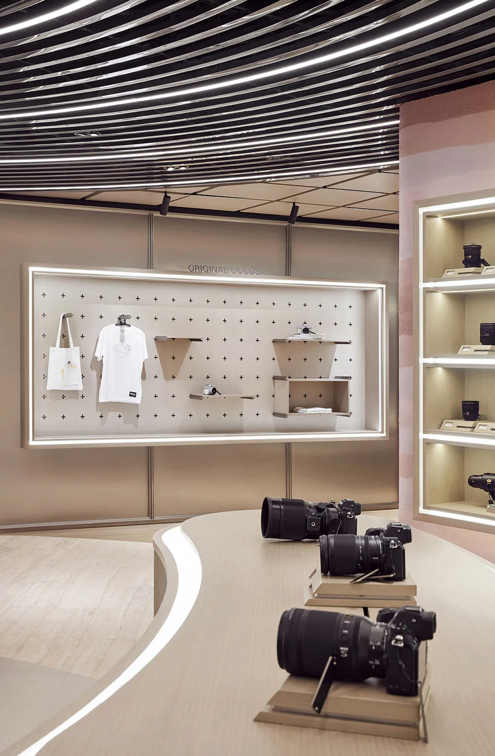 Modern, minimalist photography store featuring wooden materials and sleek design.