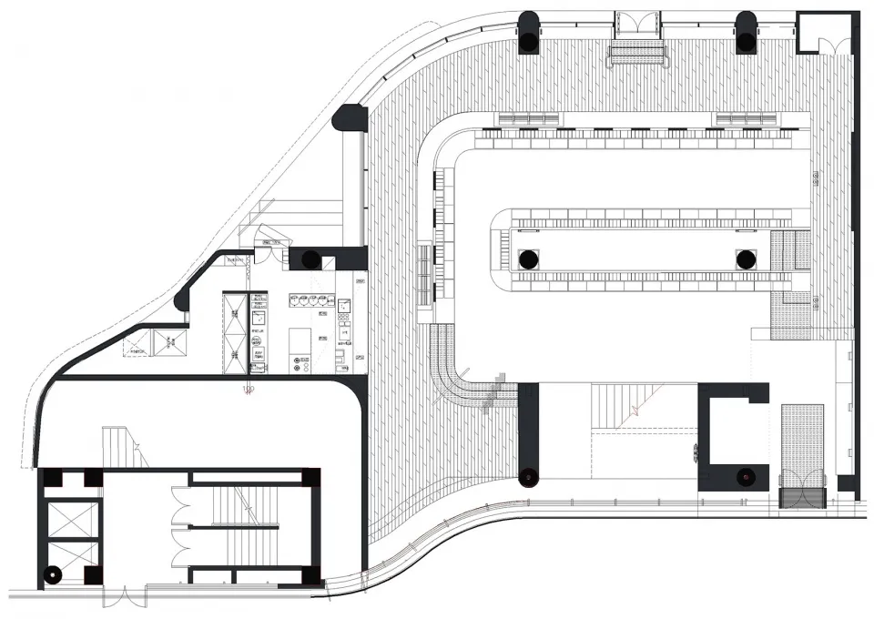 一張詳細的二維建築圖，描繪建築物的樓層平面配置。