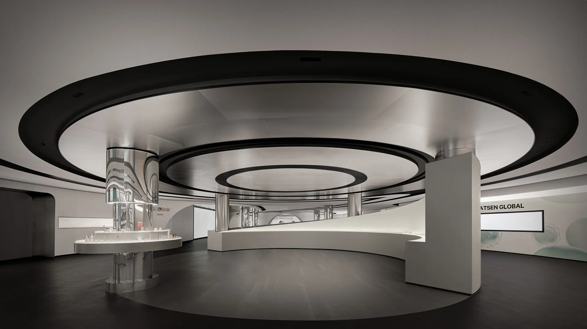 Modern retail space featuring metallic, concrete, and glass materials