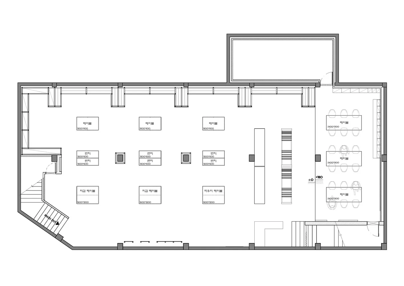 Floor plan of an office layout with desks and conference rooms.