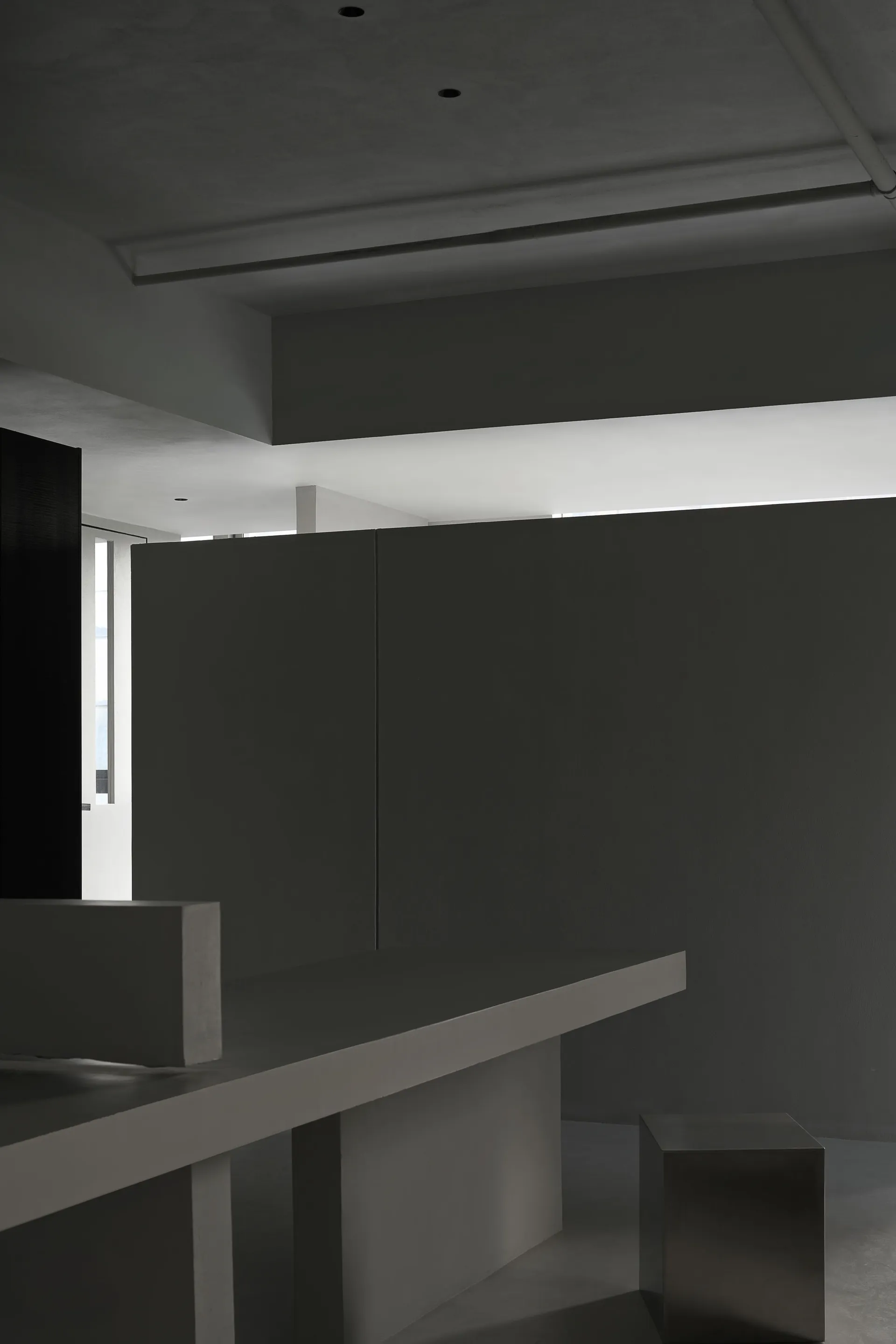 Minimalist office interior with concrete walls and modern design