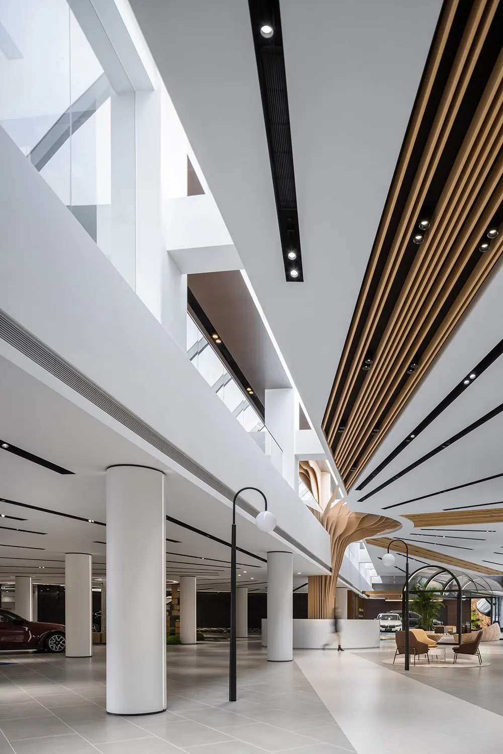 A modern building interior with white architecture and contemporary design elements.