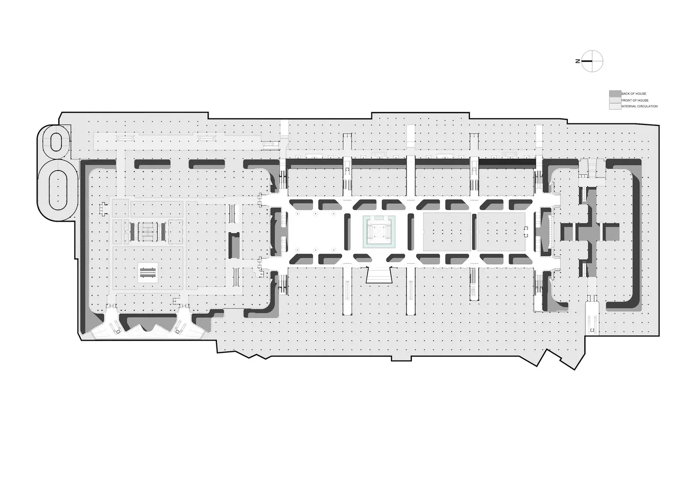 An overhead view of an industrial office layout showing concrete flooring and rectangular offices.