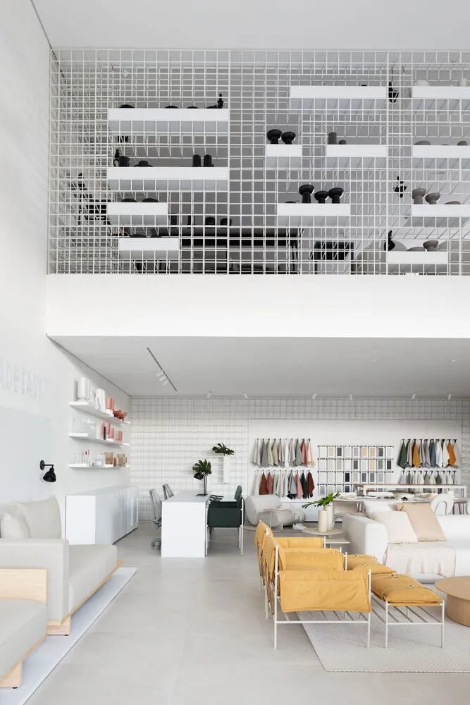 Modern retail store interior with metal shelves and ceramic tiles