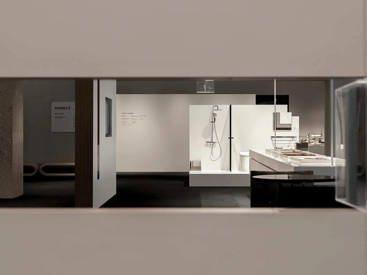 A modern kitchen with a white countertop, stainless steel appliances, and minimalist design.