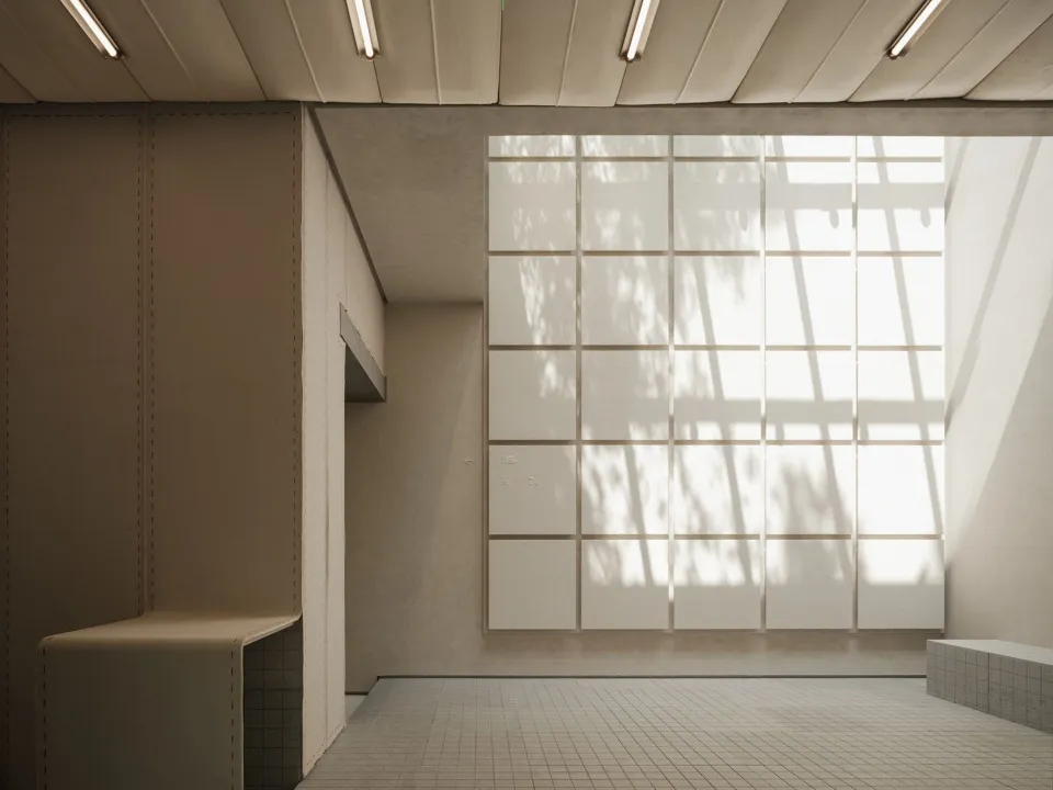 A modern office space featuring a glass ceiling