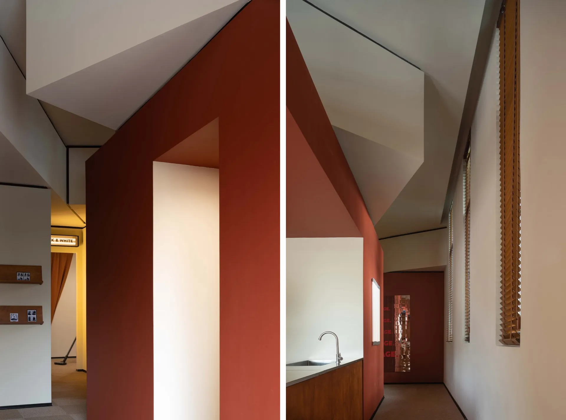 An image showcasing the modern design of a residential hallway with red brick walls and a contrasting white ceiling.