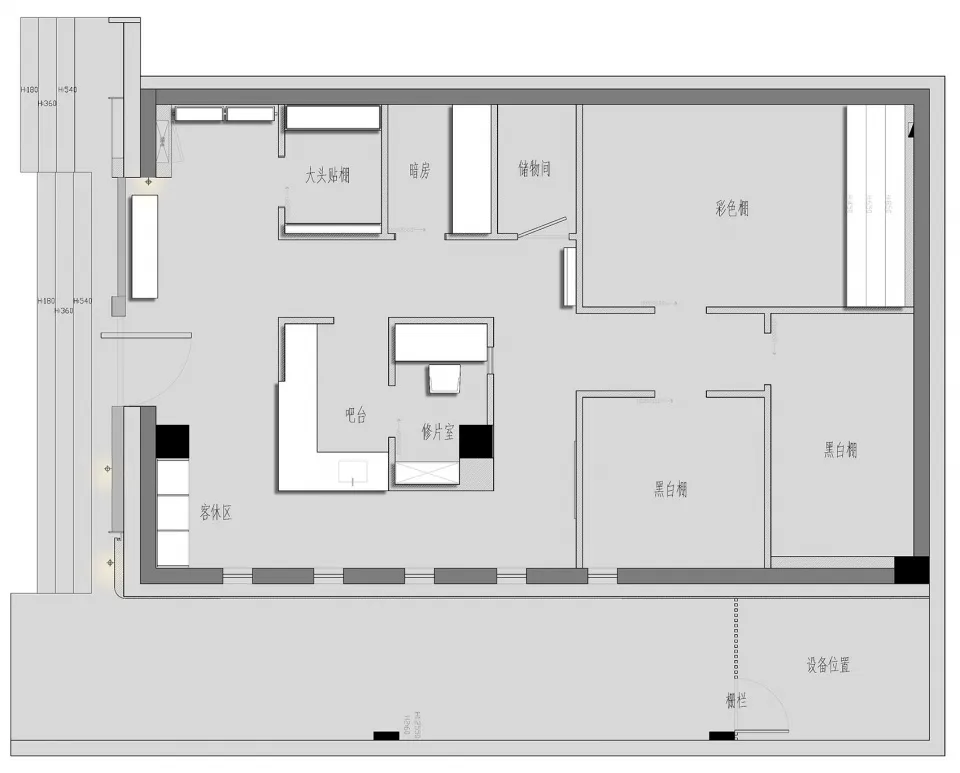 Minimalist residential floor plan with bedrooms, kitchen, and storage areas.