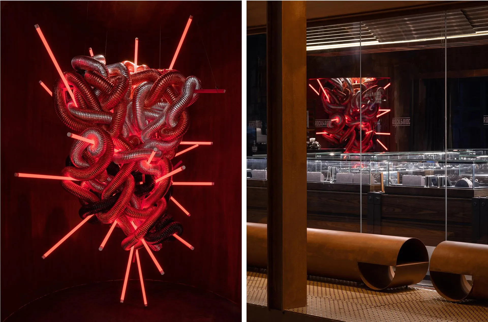 Modern interior design featuring metallic structures and neon lights.