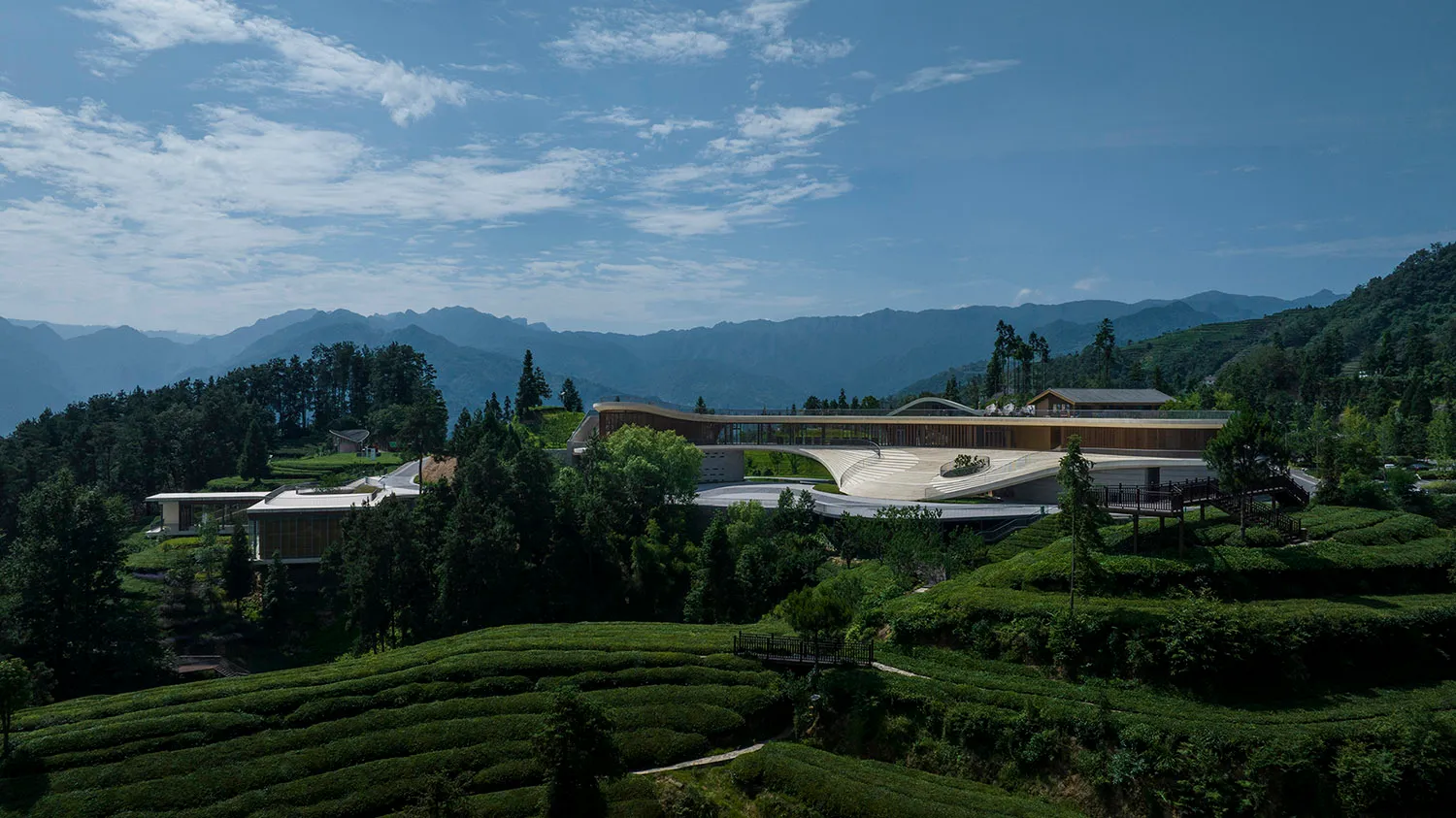 A modern architecture resort with terraces and greenery.