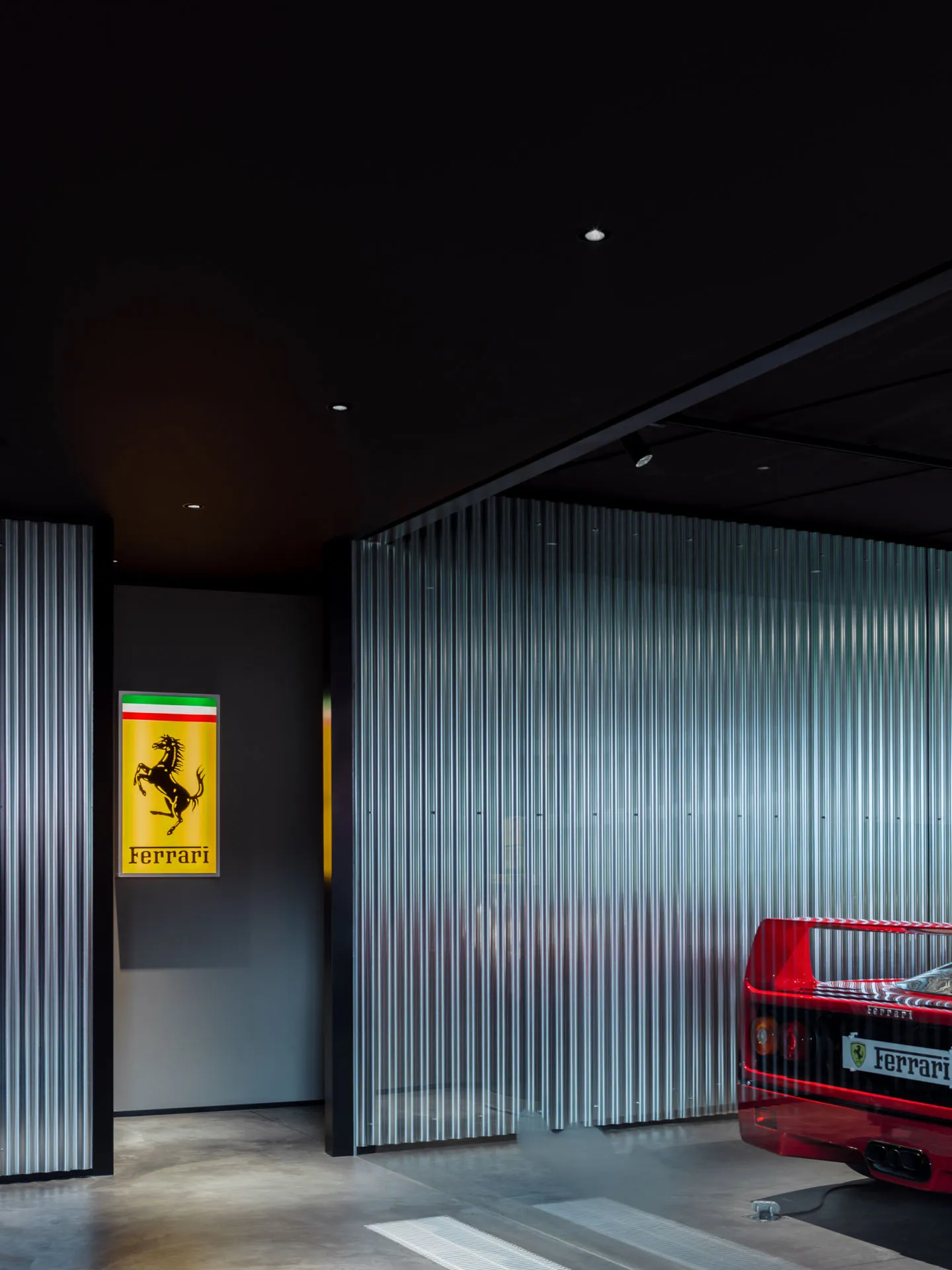 Modern metal garage interior with Ferrari F40
