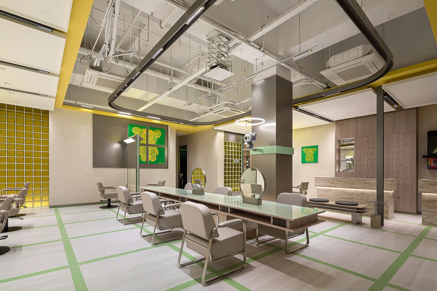 A modern salon with white flooring and minimalist design features.
