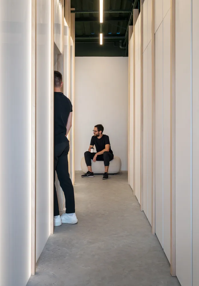 A minimalist interior with modern, concrete architectural elements.