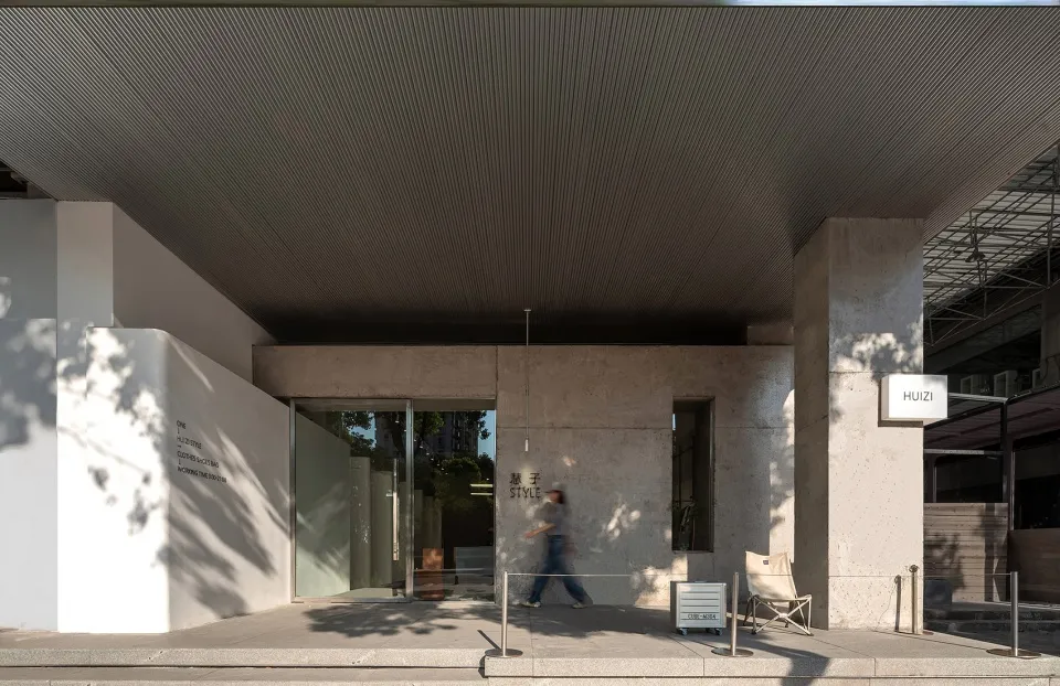 A modern shopfront with a concrete exterior.